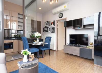 Modern main living area with dining space and kitchen view