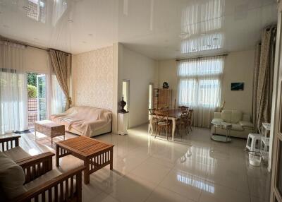 Spacious and well-lit main living area with elegant decor