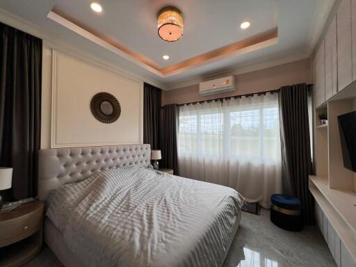 Spacious bedroom with modern decor