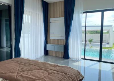 Bedroom with pool view