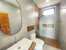 Modern bathroom with walk-in shower and wooden accents