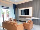 Modern living room with leather sofas and a flat screen TV