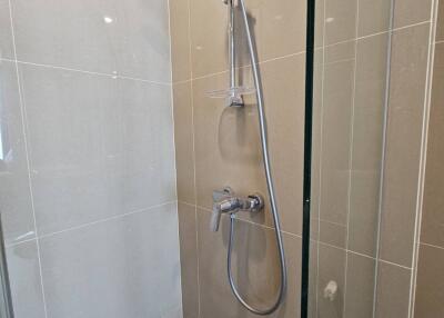 Modern shower area with glass door