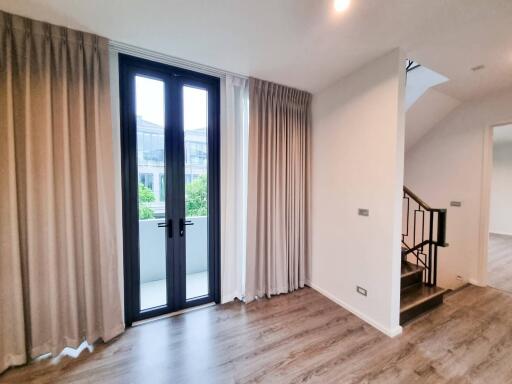 Living room with balcony entrance