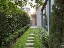 Beautiful garden pathway alongside modern building