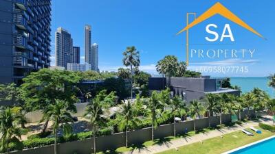 External view of the property with swimming pool and cityscape