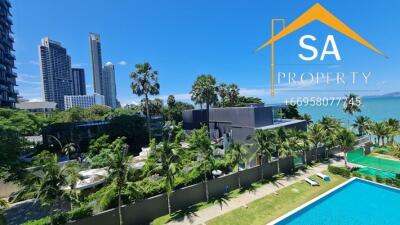 Apartment balcony view with swimming pool and cityscape