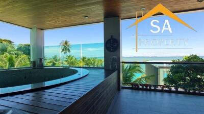 Balcony with hot tub and ocean view