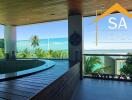 Balcony with hot tub and ocean view