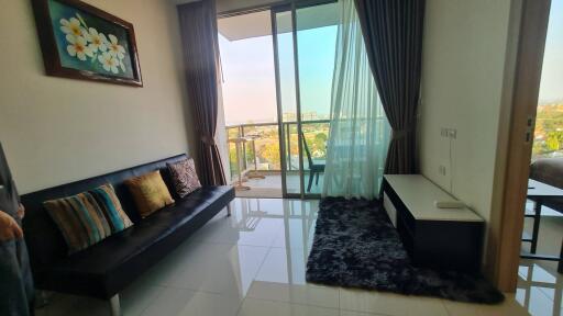 Living room with a balcony view