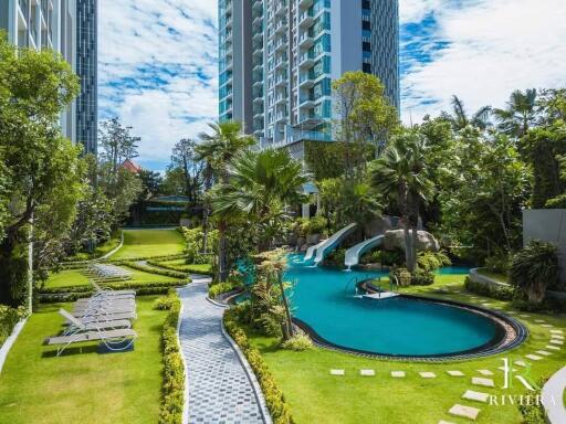 Outdoor area with pool and lounge chairs