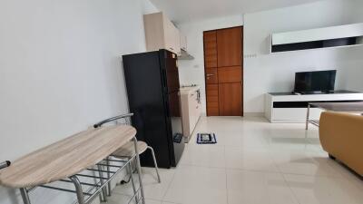 Modern living area with kitchen and dining space