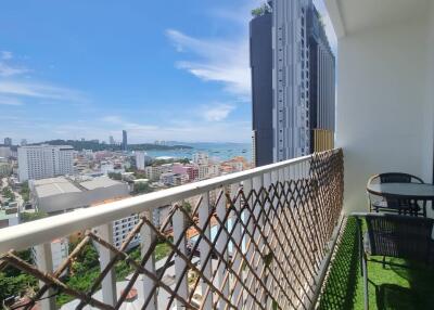 High-rise balcony with city and ocean view