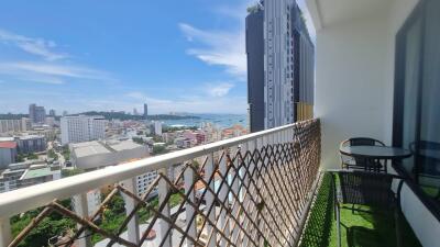 High-rise balcony with city and ocean view