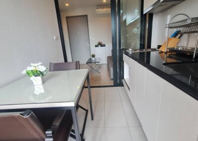 Modern kitchenette with dining area