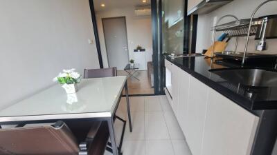 Modern kitchenette with dining area