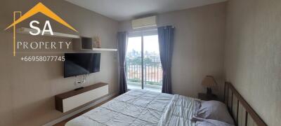 Bedroom with balcony view