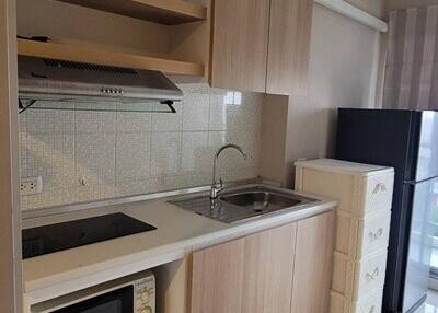 Modern kitchen with wooden cabinets and appliances