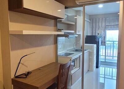 Modern kitchen space with desk and air conditioning