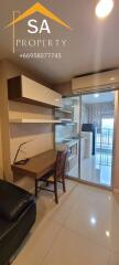 Modern kitchen space with desk and air conditioning