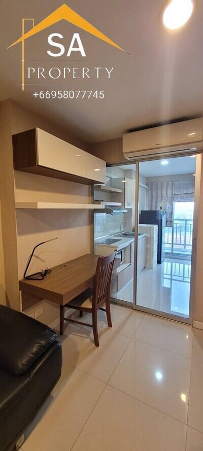 Modern kitchen space with desk and air conditioning