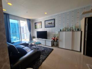 Modern living room with large window and city view