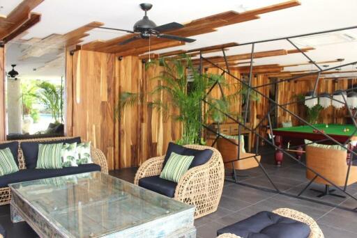 Stylish living room with wooden accents and indoor plants