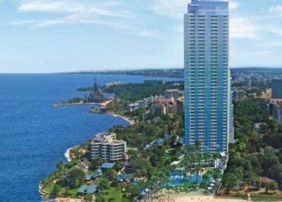 Aerial view of a high-rise building near the coastline