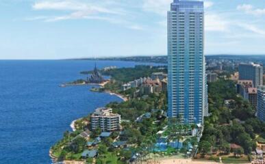 Aerial view of a high-rise building near the coastline