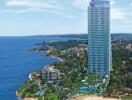 Aerial view of a high-rise building near the coastline