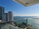 View from balcony with ocean and cityscape