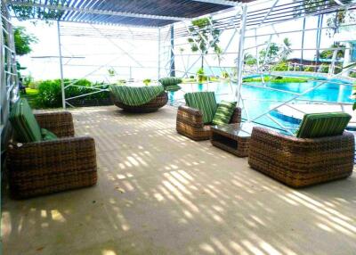 Outdoor seating area near swimming pool