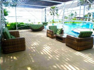 Outdoor seating area near swimming pool