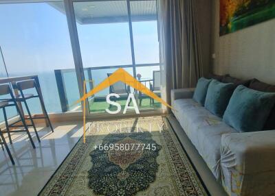 Living room with ocean view and balcony