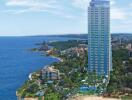 Aerial view of a high-rise building by the coastline