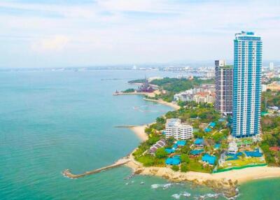 Aerial view of coastal high-rise buildings and beach