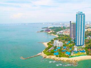 Aerial view of coastal high-rise buildings and beach