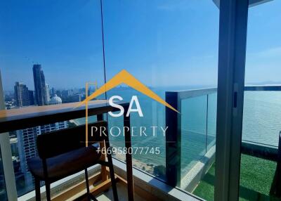 Balcony with a view of the city skyline and ocean