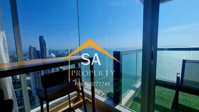 Balcony with a view of the city skyline and ocean