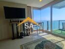 Living room with large windows and sea view