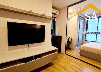 Bedroom with modern decor and television