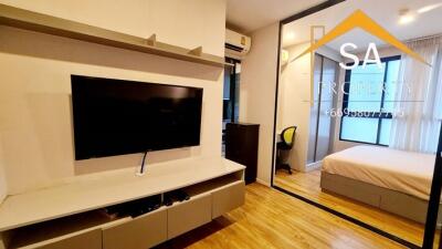 Bedroom with modern decor and television