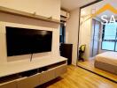 Bedroom with modern decor and television