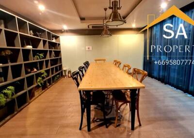 Modern dining room with a long table and chairs