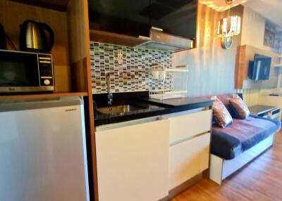 Modern kitchen with adjacent seating area