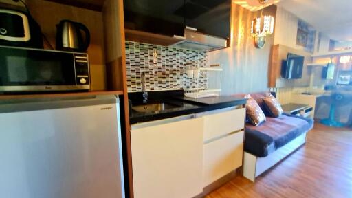 Modern kitchen with adjacent seating area