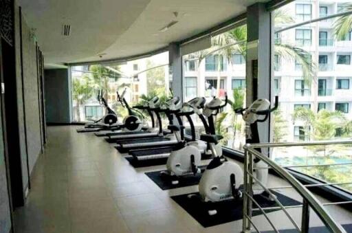 Modern gym with cardio equipment in a residential building