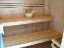 Wooden sauna interior with seating benches