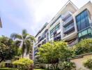 Modern apartment building with surrounding greenery