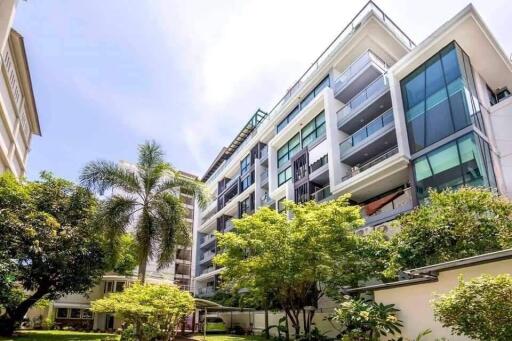 Modern apartment building with surrounding greenery